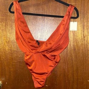Rusty orange bodysuit
